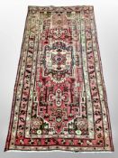 A Hamadan rug, Northwest Iran, 208cm x 104cm.