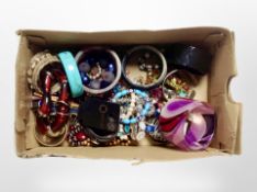 A box of assorted costume bangles and bracelets
