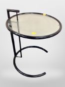 A Scandinavian circular glass lamp table,