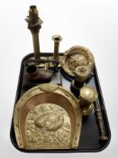 A group of brasswares including lamp base, candlestick, lion mask door knocker, money box, etc.