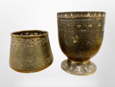 A 19th century Indo-Tibetan silvered brass goblet, height 12cm, and a further vessel.