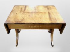 A 19th century Continental mahogany and satinwood inlaid drop leaf sofa table,