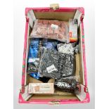 A box of new retail stock items - Swimming goggles, shin pads,