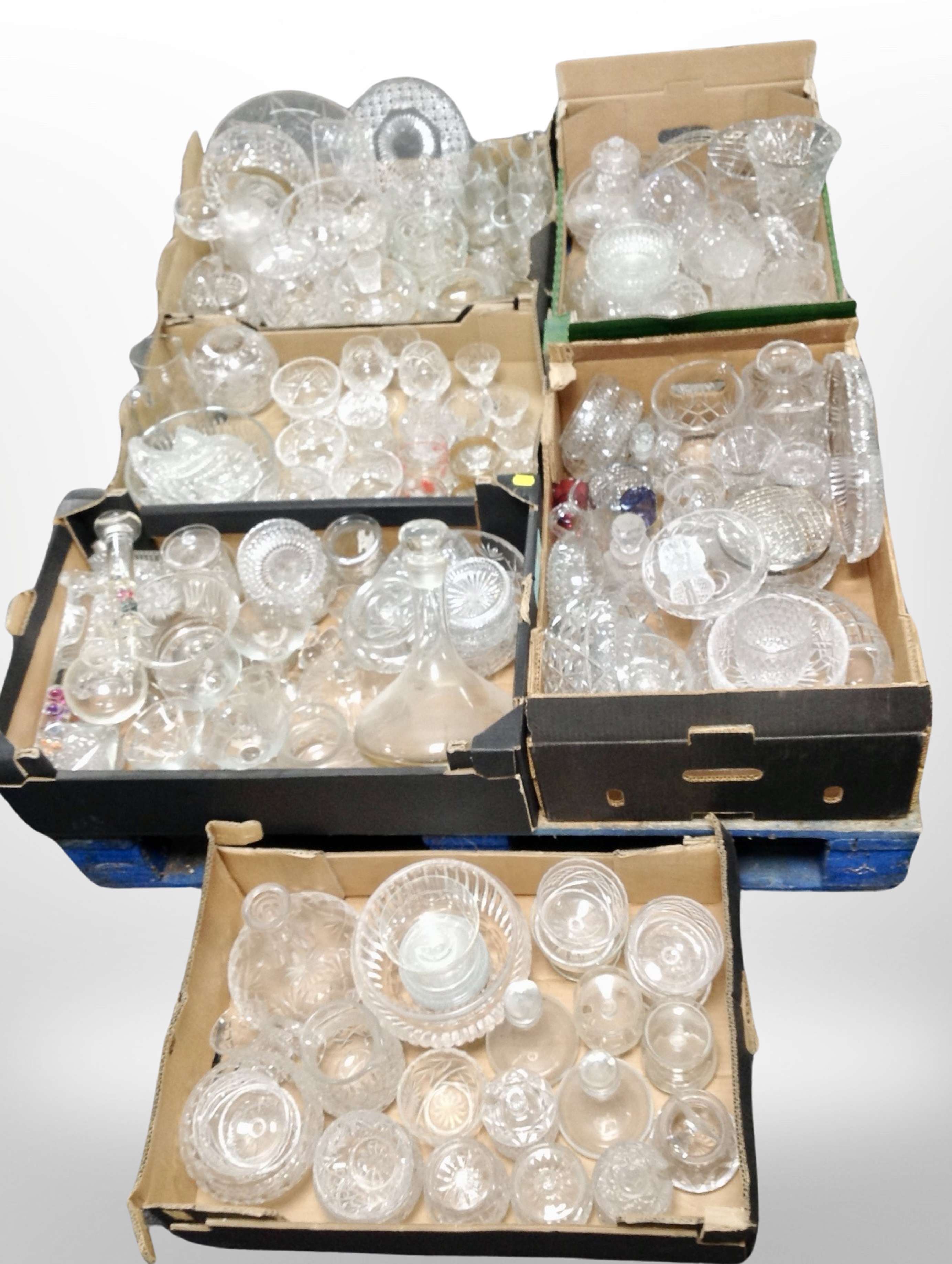 A pallet containing a large quantity of crystal and pressed glass