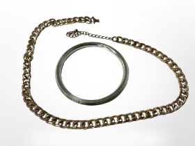 A steel circular bangle together with a gold plated chain (af).