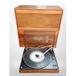 A Bang and Olufsen beogram 1000 turntable, together with a pair of teak-cased Norwegian speakers.