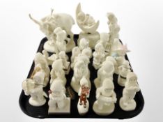 A collection of Snowbabies figures, several cherished teddies ornaments,