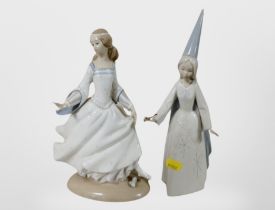 A Lladro figure of a girl holding a magic wand, and a further figure of a girl in a dress.