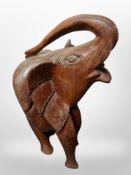A carved hardwood figure of an elephant,