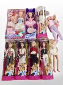 A group of boxed and unboxed Barbie dolls, including Girls Aloud and a further Sindy doll.