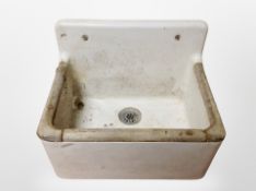 A porcelain sink,