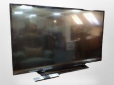 A Toshiba 42 LCD TV with lead and remote