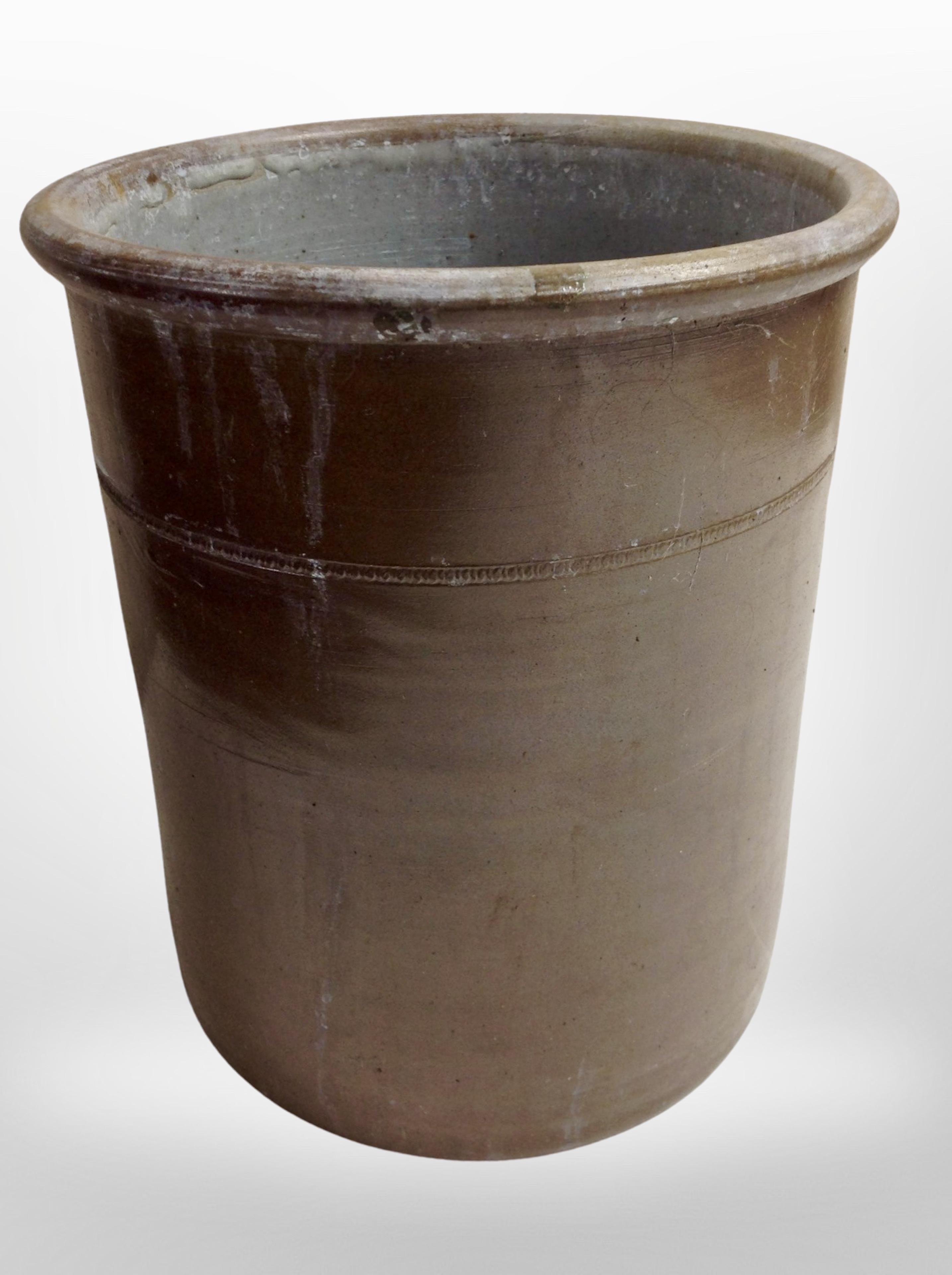 A glazed earthenware cylindrical pot, height 27 cm,