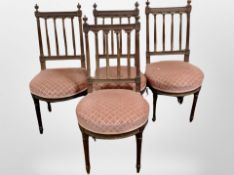 A set of four carved oak salon chairs