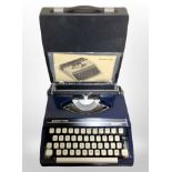 A Silver-Reed typewriter in box