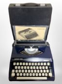 A Silver-Reed typewriter in box