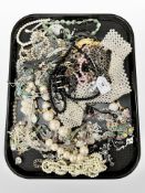 A tray of costume jewellery, necklaces,