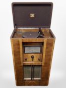 A His Masters Voice stereogram in walnut cabinet,
