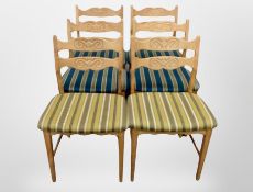 A set of six Danish blond oak dining chairs