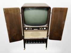A mid 20th century Herkules de luxe television in cabinet