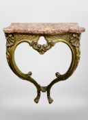 A gilt marble topped console table,