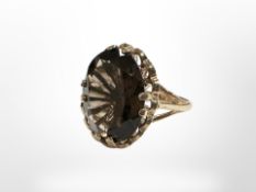 A 9ct yellow gold smokey quartz ring, size M. CONDITION REPORT: 5g.
