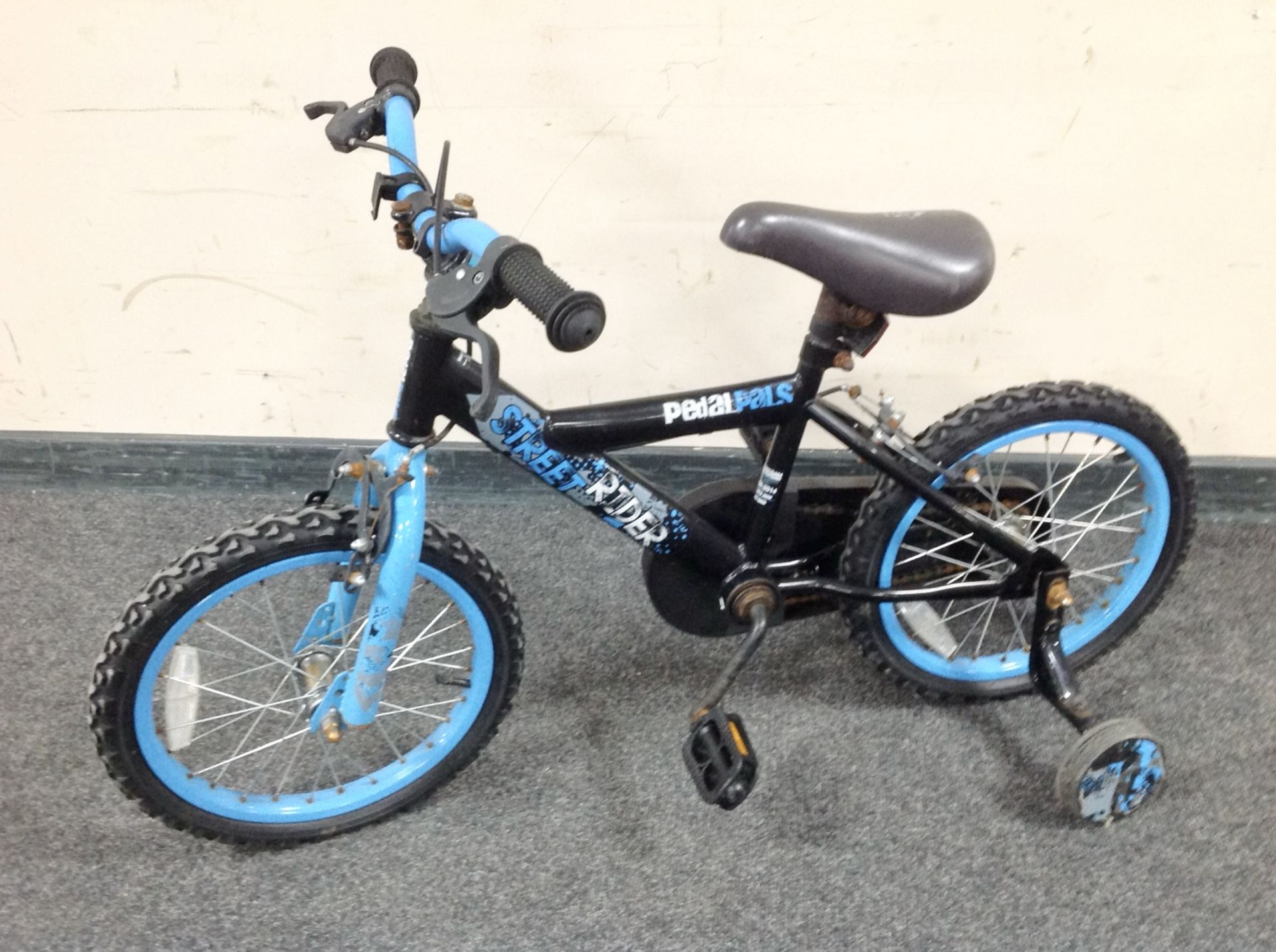 A child's straight rider bike.