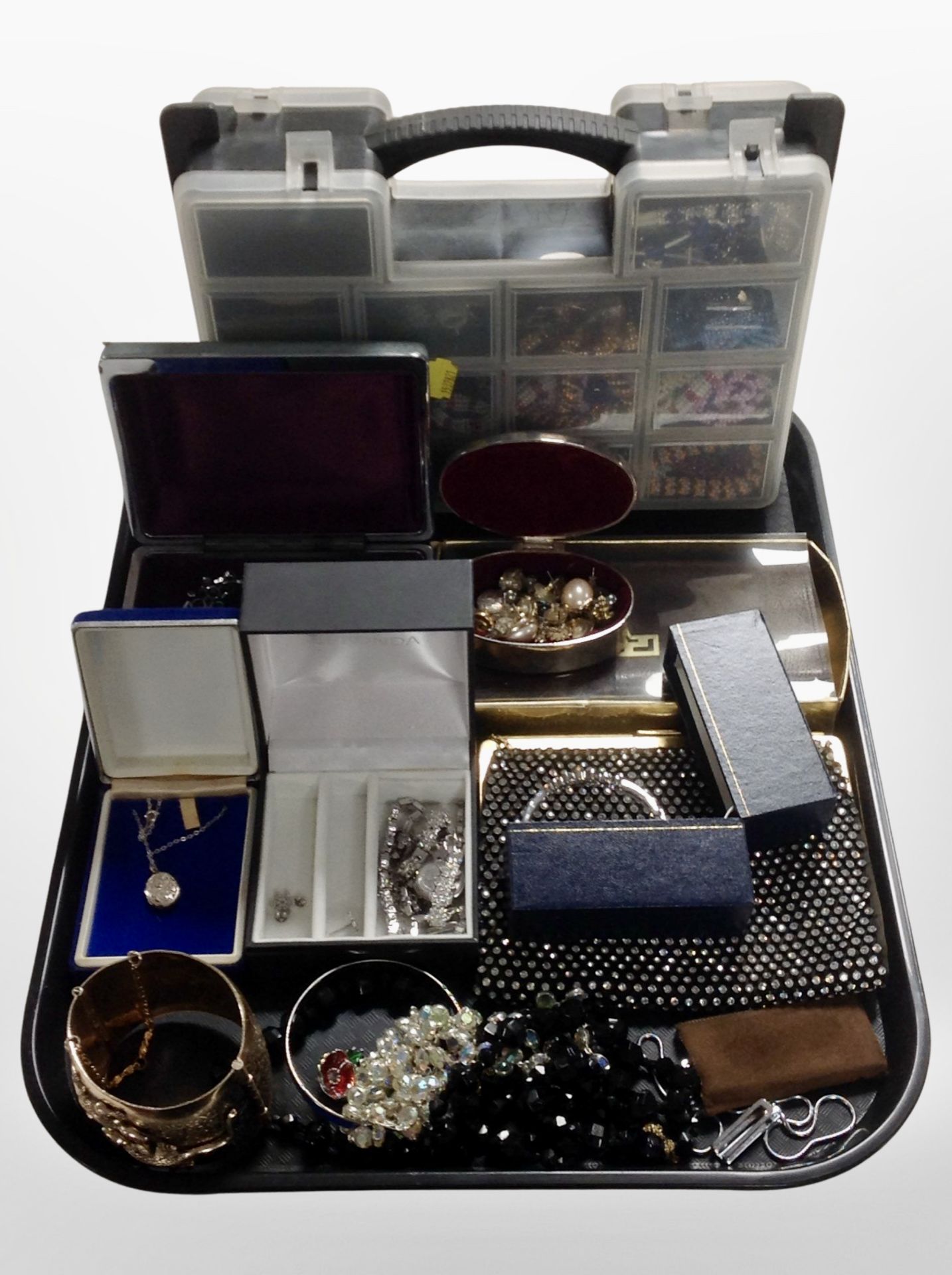 A group of costume jewellery, gold-plated bangle, two small silver lockets, purses, beadwork items.