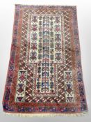An antique Balouch prayer rug, Afghanistan,