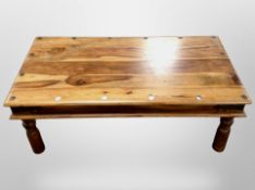 A sheesham wood coffee table,