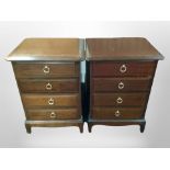 A pair of Stag Minstrel four-drawer bedside stands, width 53cm.