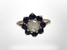 A 9ct yellow gold cluster ring set with synthetic stones, size P.