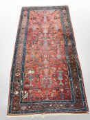 A Hamadan rug, North West Iran, 220cm x 111cm (a/f), together with smaller Hamadan rug.