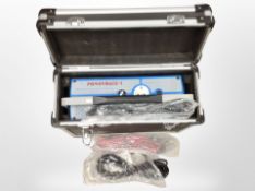 A flight case containing PowerMate-1 professional battery supply,