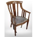 A 19th century mahogany and satinwood inlaid armchair
