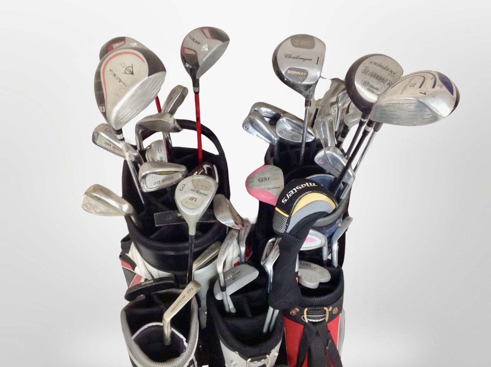 Several golf bags containing assorted drivers and irons including Donnay, Masters, - Image 2 of 2
