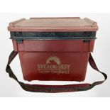 A Steade-Fast fishing box containing assorted fishing equipment including reels, line, lures, tools,