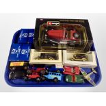 A group of diecast vehicles including Corgi and Burago, some boxed.