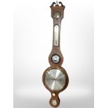 An inlaid mahogany banjo barometer with silvered dial.