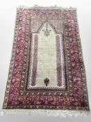 A Keyseri silk prayer rug, West Anatolia, 194cm x 120cm.
