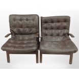 A pair of 20th century Danish brown stitched leather stained beech bentwood armchairs