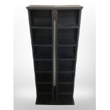 A pair of contemporary CD racks, width 21cm.