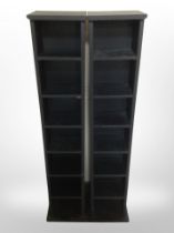 A pair of contemporary CD racks, width 21cm.