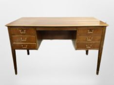 A mid 20th century Danish walnut writing desk fitted six drawers,