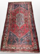 A Hamadan rug, North West Iran, 207cm x 108cm.