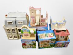 A group of Sylvanian Families models, some boxed.
