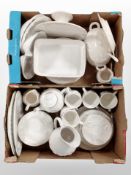 Two boxes of Saint Michael white porcelain tea and dinner wares.
