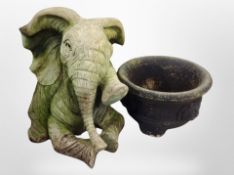 A plastic elephant garden ornament, height 49 cm,