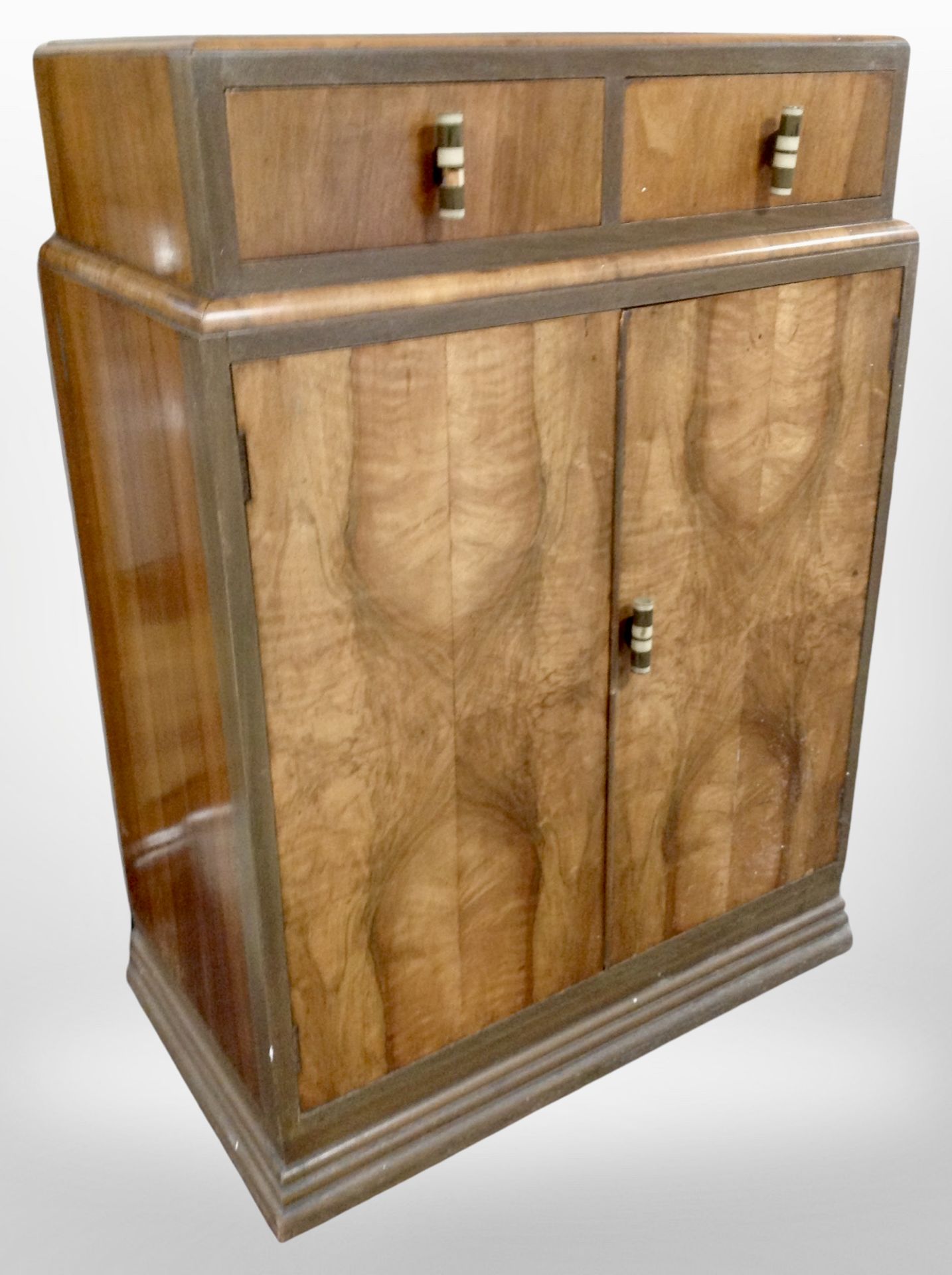 An Art Deco walnut double-door linen cabinet, width 77cm.