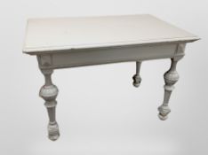 A 19th century painted pine rectangular table, on bulbous legs,